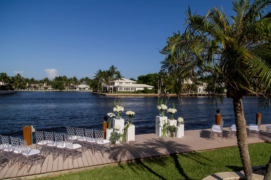 Elegant white wedding tablescape beside the water — Alexander and Olga wedding