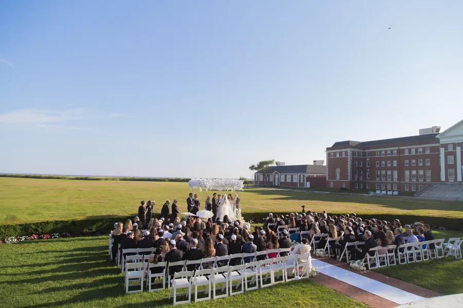 Wedding guests watching the couple exchange vows — David and Katia wedding